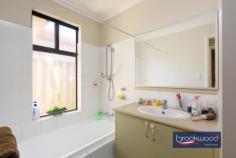  Unit 6/52 Sayer St Midland WA 6056 $525,000 Positioned towards the rear of the strata complex, this unit, with a flowing layout, courtyard and garage, offers exceptional convenience and remarkable walkability to local amenities. 3 bedrooms 2 bathroom 2004-built brick and tile OP kitchen meals family Well-equipped kitchen Courtyard and storeroom Shoppers’ & single garage Split system air conditioner 159 sqm 98 sqm internal Walk shops, schools, transport A small foyer flows effortlessly into the heart of this unit – an open-plan kitchen, meals and family room that creates a versatile central living hub. A sliding door brings natural light while providing seamless access to the north-west-facing courtyard – perfect for potted plants, outdoor seating, and dining. The kitchen occupies the central position within this thoughtfully conceived open-plan arrangement. An electric wall oven, 4-burner gas hob, built-in pantry, and practical under-bench cabinetry complement an L-shaped bench. A reverse-cycle air conditioner ensures year-round comfort throughout this primary living zone. The main bedroom, situated at the front of the floor plan, offers a private retreat complete with an ensuite bathroom and a ceiling fan for summer comfort. Two additional bedrooms complete the accommodation, each appointed with built-in robes. One junior bedroom has air conditioning and enjoys courtyard views, while the second has a ceiling fan. Both rooms have convenient access to the family bathroom – an over-tub shower and vanity – and a separate WC. The home’s practical credentials are further enhanced by a well-positioned laundry with direct access to the single garage via a convenient shopper’s entry – an invaluable feature when arriving home with groceries or during the depths of winter and the height of summer. Additional storage solutions include a secure storage room arranged off the central courtyard. This unit represents an astute opportunity for those seeking contemporary, low-maintenance living with the convenience of a central location. It is just minutes from Midland Gate Shopping Centre, bus stops, schools, and TAFE. St John of God Hospital and the New Midland Railway Station are accessible by a comfortable walk. The thoughtful floor plan balances private and communal spaces, while practical features ensure everyday living is both comfortable and convenient. 
