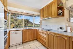  8B Melane Road Old Beach TAS 7017 $889,000 From a superb location at the end of a peaceful no-through road, this elevated acreage delivers spectacular vistas across the treetops to the Derwent River, majestic Kunanyi/Mount Wellington and beyond. This exceptional property is brimming with features, all of which are enriched by the surrounding environment where you can immerse yourself in nature as you explore untouched bushland abundant in native wildlife. Wander through the beautiful gardens of the fully fenced area around the home or just sit back and enjoy the birdsong in your own slice of Tasmania's stunning southern region. Drive through the electric gates to discover the perfectly oriented home, allowing the capture of sights and sounds of your surroundings at almost every turn. Step inside to a large and light filled living and dining area, each with easy access to your choice of outdoor spaces to gather with guests or simply relax. Create a feast to share in the well equipped kitchen, then move to either the garden terrace or huge deck to embrace those views you'll never tire of. Three bedrooms and two bathrooms also grace the layout here. Two bedrooms share the main bathroom with spa bath and separate shower and the master bedroom, with walk-in robe, is also complemented with an ensuite for added privacy. Designed with sustainability in mind, this property features solar panels, a grey water system, ceiling insulation, and a water tank, making it both eco-friendly and cost effective. Outdoors a powered double garage with remote controlled doors and ample hardstand with room for the van or boat takes care of vehicle accommodations. A community of welcoming neighbours and fabulous convenience go hand in hand here, where access to bus routes can be found at the end of the road and all retail options and essential services a short drive away. Both the airport and Hobart's bustling city centre are a 25 minute drive from home and when adventure beckons, all the natural beauty of the glorious Tasman Peninsula or the sweeping vistas of the gorgeous east coast are in easy reach. • Elevated acreage property in a tranquil pocket on Otago side of Old Beach • Peaceful no-through road with excellent neighbours • Fully fenced house yard with gorgeous gardens • Natural bushland with abundant birds and wildlife • Large, light filled living areas and well equipped kitchen • Expansive deck with stunning views • 7x6m powered garage with remote controlled doors plus hardstand for boat or van • Solar panels, greywater system, water tank, ceiling insulation • Wood heater, heat pumps, ceiling fans • Bus stop at the bottom of the road, close to major retail centres • 25 minute drive to the airport and Hobart's CBD 