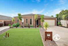  4 Chamberlain St Cranbourne East VIC 3977 $825,000 - $875,000 Room for the Whole Family? You Bet! Flawlessly presented and thoughtfully designed for comfort and convenience, this impressive residence is set on a generous 676m² (approx.) allotment with side access, nestled in a quiet, family-friendly street. Created with the modern family in mind, the flexible open-plan layout offers three separate living zones, providing ample space for everyone to relax, work, or play. Accommodation includes four well-appointed bedrooms, with the master suite featuring a walk-in wardrobe and private ensuite. The additional bedrooms include built-in robes and share a stylish central bathroom. At the heart of the home, the modern kitchen overlooks the spacious family and dining areas, flowing seamlessly to the large covered alfresco, ideal for year-round entertaining. Additional features include ducted heating and evaporative cooling for year-round comfort, a double-car garage, perfectly positioned in a sought-after pocket of Cranbourne East, with schools, shops, parks, and public transport all just moments away — this is the home you’ve been waiting for! 