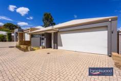  Unit 4/23 Coongan Ave Greenmount WA 6056 $599,000 Discover the magic of a well-considered floor plan, a cohesive palette of colours and materials, and an incredibly convenient location. Nestled within a small, secure complex, this contemporary strata unit presents an enviable lifestyle opportunity. Positioned opposite a reserve and mere steps from the Heritage Trail, the property combines the best of urban convenience with a sense of peaceful retreat. Low strata fees, a private outdoor entertaining space, and a two-car garage with storage elevate this impeccably presented unit above the ordinary. 3 bedrooms, 2 bathrooms 2017-built brick and iron Open-plan kitchen lounge Kitchen w stone benchtops Sep junior bedroom wing Alfresco entertaining UMR 2-car garage with shoppers’ Secure 206 sqm block Low maintenance living Close airport Midland Trail A small front garden behind a low wall leads to this nearly new unit’s front door and entry hall. To one side, the principal suite, and to the other, a shoppers’ entry from the two-car garage. A split-level design creates a clever separation of spaces, with the principal suite strategically positioned to offer a tranquil retreat from the home’s social areas. The main bedroom is a sanctuary featuring plush carpeting, an elegant ceiling fan, a spacious walk-in robe, and a chic ensuite that elevates your daily routine. Steps lead up to the open-plan kitchen, meals, and family room. High ceilings and large windows ensure this central living zone is filled with natural light. A generous sliding door dissolves the boundary between indoor comfort and outdoor freedom, inviting the landscape into each day. A carefully curated colour palette creates visual harmony throughout the home. Crisp white walls provide a clean backdrop for sophisticated grey undertones, complemented by subtly patterned floor tiles, plush bedroom carpeting, and elegant stone benchtops that tie the entire home together with a cohesive design. In the generously proportioned kitchen, a splashback of textured white tiles echoes the sleek finish of high-gloss cabinets topped with a U-shaped stone benchtop. A built-in pantry, overhead and under-bench storage, an electric oven, and a gas hob provide cooks with everything they need to excel in their culinary adventures. A private courtyard-style garden at the home’s northeast corner extends your living space. It includes a paved dining area partially sheltered under the main roof, perfect for alfresco entertaining and seamless indoor-outdoor living. The home’s junior wing offers two well-appointed bedrooms, each with built-in wardrobes and one with a ceiling fan. A generous family bathroom, convenient walk-through laundry, and substantial linen storage complete the practical design. From the convenient two-car garage to the meticulously designed interior, this home represents modern living at its finest – where every detail combines to create a beautiful and brilliantly functional space. First home buyers, FIFO workers and downsizers, your new lifestyle awaits, offering comfort, style, and an unparalleled living experience. 
