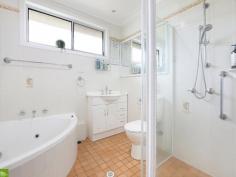  3 Wallabah Way Koonawarra NSW 2530 $850,000 - $900,000 A much loved single level home presents here at 3 Wallabah Way, Koonawarra. This well-maintained 4-bedroom home sits on a generous 552sqm block and offers everything a growing family needs. Featuring a bright central bathroom, double garage with extra carport, and a spacious enclosed entertaining area, it's built for both comfort and convenience. Enjoy the beautifully landscaped garden and fully fenced rear yard - perfect for kids, pets, and outdoor living. Located close to schools, shops, and Lake Illawarra, this is a fantastic opportunity in a family-friendly street. Featuring • 4 Good Sized Bedrooms • Large Lounge Room • Spacious Enclosed Entertaining Area • Beautifully Upkept Garden • Tandem Garage with Extra Carport • Fully Fenced Rear Yard • 552sqm Block 