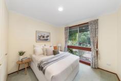  62 Southwell Street Weetangera ACT 2614 Looking for separate accommodation options for an adult child or ageing parents, or want an additional income to offset the mortgage? This sensational property offers not only a classic four-bedroom, two-bathroom home but has the added asset of a freestanding one-bedroom flat with its own driveway and carport. It is all possible because of the enormous 1283sqm corner block which allows the main home to have a lovely circular driveway off Southwell St, and the flat to be reached via a separate entrance off Mckeahnie St. Both properties have single-level layouts. The primary residence's living areas include a family room, meals area off the kitchen and a formal lounge and dining room. The formal entertaining rooms are divided by a pony wall so as to not impede any of the delicious northerly light. Sliding doors off the casual living areas provide access to an entertainers' deck that looks across the substantial rear yard. Tucked to the side is the spacious flat which has its own carport and a rear courtyard wrapping two sides. The open kitchen, lounge and meals space here has garden views front and rear and the generous bathroom incorporates not only a shower and bathtub but also has plumbing for a washing machine. Located opposite the Weetangera Primary School and just an eight-minute walk from baked treats and coffee at the Weetangera bakery and bushwalking paths on the Pinnacle Nature Reserve, these homes are also a commuter's dream, with Belconnen Town Centre just five minutes by car. FEATURES • Two freestanding homes on one enormous block • Separate one-bedroom unit with single carport and storage, open-plan living, private carport, big bathroom with plumbing for washing machine, queen-sized bedroom and split system • Primary residence with front deck and rear covered deck • Solid internal doors • Formal lounge and dining with grand double door entry • Ceiling fans • Split system to kitchen and meals area • Large kitchen with gas cooktop, dishwasher, Miele oven, full-height pantry and oversized refrigerator cavity • Built-in wardrobes to all bedrooms • Good storage • Neat family bathroom • Ensuite primary bedroom • Laundry with rear access • Double carport • Paved horseshoe driveway • Additional parking pad to primary residence • Productive garden 