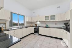  9 Carysfort Street Hurstville NSW 2220 Ideally suited to families seeking comfort and practicality, this appealing double-brick bungalow combines original character with modern ease, offering generous interiors and the rare addition of a self-contained studio apartment that is ideal for intergenerational living or additional income. Conveniently set just 750m to Hurstville station, it's a short stroll to the area's premier shopping and vibrant dining precinct. A terrific opportunity with instant appeal in an unbeatable central location. *Three bedrooms with mirrored built-in robes and 1.5 bathrooms *Combined living and dining flows onto balcony plus a family room *Modern kitchen with granite benches and stainless gas appliances *Stylish and fully tiled bathroom with separate bathtub and shower *Floating timber flooring, air conditioning, solid double-brick build *Includes a separate self-contained one-bedroom studio apartment *Low-maintenance garden at the rear and terrace with a citrus tree *A single lock-up garage plus two carport parking spaces available 