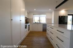  38 Davis Road Monjingup WA 6450 $1,350,000 Looking for the ultimate treechange? This stunning 1.63-hectare farmlet delivers lifestyle, space and luxury – all just 9km from town and capturing mesmerising Lake Warden views. Freshly painted, this rendered double brick and colorbond home offers: • 4 large bedrooms (all with robe space) • 2 modernised bathrooms • Open plan living with fireplace & reverse cycle airconditioner • Formal lounge + separate kids’ activity room • Office/study space • Fully rewired with new LED lighting and full insulation Step outside to an entertainer’s paradise: • Eco-decked gabled patio with built-in heaters • Heated 9m x 4m below-ground pool with new landscaping • Low-maintenance lawns and gardens with exposed aggregate paths • Firepit area, pump track, and cubbyhouse for the kids The massive 12.4m x 15.5m powered shed with 4m high doors and 15A points is a serious bonus. Plus, the detached powered double garage features a large laundry and private home office or storage room. Water security? Sorted: • 130,000L rainwater tank feeding the entire home • Bore and additional 22,000L cement tank for gardens & animals • Multiple water points across the property This is a “move in, do nothing” lifestyle property where every detail has been carefully completed. Peaceful, private, and perfectly set up for family living with room to grow, explore and enjoy. Homes of this calibre in Monjingup don’t last long – especially with this kind of finish and land size. 