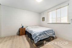  Unit 10/515 Main N Rd Elizabeth SA 5112 $350,000 Nestled in a close-knit community, this charming 2-bedroom home at 515 Main North Road is the perfect retreat for first-time buyers, savvy investors, or those seeking a delightful downsizer. Positioned on the ground level within a small group of homes, it offers a peaceful and private setting, creating a warm and welcoming atmosphere. The home exudes simplicity and practicality, with a seamless flow between the living and dining areas, enhanced by natural light pouring through large windows. The efficiently designed kitchen features sleek cabinetry and modern fixtures, making it the heart of the home where culinary creativity can flourish. Both bedrooms are generously sized and include built-in robes, ensuring ample storage while maintaining a clean and clutter-free environment. The bathroom and laundry area blend understated elegance with functionality, offering convenience and ease. Located just a short stroll from the vibrant Elizabeth Shopping district, this home offers unparalleled convenience. Public transport is within walking distance, and the Adelaide CBD is only 25km away, making connectivity a breeze. Currently leased under a fixed-term agreement until January 2026, with tenants eager to stay on, this property presents an excellent opportunity for investors or those looking to secure their first home with guaranteed rental income. Set within a well-maintained, secure complex, the home also features a cozy courtyard—perfect for enjoying a morning coffee or evening relaxation. A practical one-car garage adds further value, providing secure parking and additional storage. Key Features: • Ground-level unit in a small, tight-knit community • Built in 1960 • Secure, gated complex • Updated kitchen with electric appliances • Updated bathroom • Built-in storage in both bedrooms, plus additional linen press • Low strata administration fees ($589.85 per quarter) and sinking fund ($84.35 per quarter) • Long-term tenancy in place until January 12, 2026 • Zoned for Playford International College and Elizabeth East Primary, with other schooling options nearby 