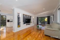  146 Douglas Street Armidale NSW 2350 $990,000 - $1,070,000 Welcome to 146 Douglas Street — a generously sized four-bedroom family home ideally positioned in the heart of Armidale. Just moments from shopping centers, the CBD, and leading private schools, this residence offers both convenience and comfort, with every feature thoughtfully designed for family living. Inside, you’ll find four spacious bedrooms, each with built-in wardrobes. The master suite is a true retreat, featuring its own living area, a luxurious ensuite with bathtub, and direct access to the covered alfresco area — perfect for morning coffee or evening relaxation. The remaining bedrooms are well-sized and share access to a beautifully appointed main bathroom with a double shower, while a third bathroom serves as a second ensuite, adding to the home’s everyday practicality. The heart of the home is the open-plan living, dining, and kitchen space — complete with polished timber floors, built-in TV cabinetry, reverse cycle air conditioning, and gas heating for year-round comfort. The modern kitchen is a chef’s dream, offering abundant storage, a dishwasher, breakfast bar, and an adjoining meals area. Step outside and the features continue: a fully fenced yard with electric gate, lush manicured lawns and gardens, a double garage plus double carport, and an impressive undercover entertaining area complete with built-in BBQ and pizza oven — ideal for hosting family and friends in style. This home is the perfect blend of space, location, and lifestyle. Don’t miss the opportunity to secure this exceptional property in one of Armidale’s most convenient and family-friendly pockets. 