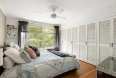  4 Palmerston Crescent Frankston South VIC 3199 $1,200,000 - $1,320,000 Taking full advantage of its prime beachside location atop Olivers Hill, just a leisurely stroll from Frankston Beach, Sweetwater Creek Reserve, and the Norman Avenue shops, this private home unveils a relaxed beachside lifestyle across its low-maintenance Frankston High School Zone address. With its thoughtfully designed four-bedroom layout that maximises natural light, this inviting home presents an exceptional opportunity for growing families eager to infuse their personal style into every corner. Introduced via solid timber floors and a dedicated lounge, where a charming gas log fireplace invites cosy evenings with loved ones, the single-level layout opens to a well-equipped kitchen that boasts premium appliances, including a Fisher & Paykel electric cooktop, Bosch wall oven, and dishwasher, making meal preparation a pleasure. The warmth of the summer air enhances a covered deck alfresco, providing a restful setting to watch the kids at play, or privately entertain with a serene garden backdrop featuring a children's cubby and double garage/storage. With four bedrooms each featuring ceiling fans, set alongside a main bathroom, compact study, dedicated laundry, large side shed, and ample off-street parking, the home's comforts continue with gas ducted heating and evaporative cooling. Ideal for young families and couples eager to embrace opportunities that nurture their creative vision, this 1,011sqm (approx.) block is just moments from Bayside Shopping Centre, Mount Eliza Village and public transport, allowing for a lifestyle that blends beachside leisure with everyday conveniences. 