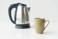  A sleek and modern Stainless Steel Kettle Electric is elegantly displayed on a clean kitchen countertop, its polished surface gleaming under soft lighting. The kettle features a minimalist design with ergonomic handle and spout, emphasizing its premium build quality and functionality. In the background, subtle hints of luxury bathroom accessories in Australia can be seen through an adjoining room—reflecting a consistent style of everyday perfection and refined taste across home spaces. This image captures the essence of modern living, where design and practicality meet seamlessly. 
 