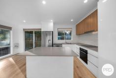  3 Fairview Drive Kingston TAS 7050 $645,000 - $705,000 Beautifully renovated and bathed in natural light, this stylish home is ready for you to simply move in and enjoy. The open-plan living zone features sleek timber flooring, a fresh neutral palette, and wide windows that frame stunning mountain views - creating a warm and inviting space to relax or entertain. The contemporary kitchen is a standout, complete with glossy cabinetry, a central island bench, subway tile splashback, and modern appliances, offering both style and functionality. There are three comfortable bedrooms, one with built-in robes, and a beautifully finished bathroom featuring a freestanding tub, modern vanity, and a sleek shower - designed for both relaxation and practicality. Glass sliders connect the living space to a entertainment deck overlooking the secure backyard - ideal for kids, pets, or a weekend barbecue. Downstairs, the lock-up garage offers excellent storage and workshop space, while the area under the home also presents exciting potential for further development (STCA). A side driveway leads to a large rear shed, perfect for those needing additional storage, hobby space, or a home workshop. An excellent opportunity for first home buyers or young families seeking a modern, low-maintenance lifestyle within easy reach of shops, schools, and everyday conveniences. 