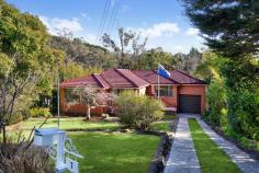  7 Hillcrest Road Wentworth Falls NSW 2782 $890,000 - $950,000 Set in an attractively secluded pocket, this well presented brick home with brand new roofing offers an exciting opportunity for anyone looking for a solid start on the property ladder. Bathed in natural sunlight, all rooms are proportionally spacious. With a slow combustion fire and a reverse cycle air conditioning wall unit as well as full reverse ducted air conditioning throughout, this home is already prepped for cosy winter evenings and warm summer climes. Freshly painted in neutral tones and with polished wood flooring throughout, this home lends itself to all personal styles. A neatly presented original retro kitchen and bathroom offers immediate practicality, whilst giving one time to prepare a future re- design if and when desired. With an elevated perspective, this home looks over a manageable area of approximately 872sqm that offers excellent potential for avid gardeners to add their own green-fingered flair. An oversized garage offers excellent storage as does the dry under house area. This home is a rare and sought after find that deserves priority viewing without delay. Breakdown of Features: 872sqm approx. block; oversized garage; established gardens affording tranquil privacy Naturally light-filled interiors; s/c wood fireplace, reverse a/c unit; fully ducted reverse a/c throughout Sep. zoned open plan kitchen and dining with elevated perspective and access to rear gardens Four well proportioned bedrooms with natural light; original family bathroom; separate WC Well presented brick veneer home with brand new roof; large single garage and underhouse storage Excellent cul-de-sac position simply 1km, 3min drive to WWF train station and all village amenities 