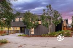  29 Willowdene Way Berwick VIC 3806 $1,050,000 - $1,150,000 Sophisticated Style, Steps from Berwick Village Positioned within the prestigious and architecturally designed Hark complex, this as new tri-level townhouse offers an exceptional fusion of modern elegance, premium finishes, and low-maintenance living — all within just 500 metres of the vibrant Berwick Village. Designed with both comfort and functionality in mind, the home features three spacious bedrooms, each thoughtfully appointed with ample storage. The master suite is privately situated on the lower level, creating a tranquil retreat complete with a sleek ensuite and a generous walk-in robe. The upper level unveils the heart of the home — a light-filled, open-plan living and dining domain that flows effortlessly onto a private balcony with elevated park views. At the centre is a beautifully appointed kitchen showcasing stone benchtops, premium stainless-steel appliances, a walk-in pantry, and an integrated dishwasher. This space is equally suited to casual daily living and elegant entertaining. Throughout the home, split system heating and cooling in every room ensure year-round comfort, while the double remote garage with internal access adds both security and convenience. Professionally landscaped, low-maintenance gardens complete the picture, allowing you to enjoy the lifestyle without the upkeep. High ceilings and refined contemporary finishes elevate the overall aesthetic, offering a sense of space, sophistication, and ease. Ideal for professionals, downsizers, or discerning investors, this impeccable residence offers a rare opportunity to secure a stylish, turn-key property in one of Berwick’s most sought-after addresses. With boutique cafés, restaurants, shopping, and public transport just a short stroll away, you’ll enjoy the perfect blend of cosmopolitan living and suburban tranquility. 
