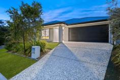  25 King Street Coomera QLD 4209 This is your chance to secure something genuinely special: the very first home to come to market on Coomera’s newly established King Street. Built in 2021, 25 King Street offers a smart layout, quality finishes, and a peaceful location that’s becoming one of the suburb’s best-kept secrets. Set on a 405m² block, the home feels spacious from the outset – high ceilings, wide entry, and plenty of natural light create an open and comfortable environment from the moment you step inside. There are two separate living areas, making it ideal for young families, couples working from home, or anyone who values a bit of breathing room. The central living space flows into a modern kitchen with stone benchtops, quality appliances, and a clean, minimalist design. It connects seamlessly to the outdoor alfresco area – perfect for easy entertaining or just enjoying a quiet afternoon outdoors. All four bedrooms are generous in size, with the master positioned at the rear for extra privacy. A walk-in robe and sleek ensuite round out the retreat-like feel, while the main bathroom also features floor-to-ceiling tiling and a sharp, modern finish. Ducted air conditioning runs throughout the home, keeping the temperature just right year-round. The property is also fitted with a 13.2kW solar system, a noteworthy inclusion that enhances the home’s overall efficiency. Whether for day-to-day living or future-proofing against rising energy demands, it’s a practical and forward-thinking feature. King Street itself is quiet, elevated, and surrounded by other well-maintained homes – a great environment for families or buyers wanting to step into a location with real long-term value. You’re only minutes from Coomera Westfield, local schools, parks, and the M1, but tucked away just enough to enjoy real peace and privacy. Key Features: • Built in 2021 • Four bedrooms, two bathrooms • Two separate living areas • Ducted air conditioning • High ceilings and wide hallway • Open-plan kitchen with stone benchtops • Covered outdoor entertaining area • 405m² block, fully fenced backyard • Double garage with internal access This isn’t just a new listing – it’s a rare opportunity to secure the first home in what’s shaping up to be one of Coomera’s most desirable streets. If you’ve been waiting for something with genuine quality, in a location with long-term upside, this is the one. 