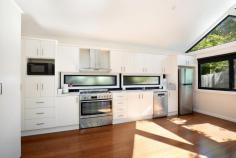  151 Hat Hill Road Blackheath NSW 2785 $895,000 - $950,000 Capturing the essence of contemporary mountain living, this thoughtfully designed property offers a seamless blend of style and practicality across two separate buildings. Ideally located just 1.8km from village amenities, it provides the perfect balance of privacy and convenience. The build features sleek Colorbond exteriors, complemented by bamboo flooring, neutral tones, and an abundance of natural light throughout. Vaulted ceilings and double-glazed windows enhance the sense of space and energy efficiency throughout. The approved rear studio offers a flexible space - ideal as guest retreat, home office, yoga space, or creative studio. This property, with its attractive aesthetic, is definitely worth adding to your priority viewing list. Breakdown of Features: Three spacious bedrooms, all with built-in wardrobes Bamboo flooring in living areas and carpeted bedrooms Naturally light-filled open plan living room with north facing aspect Flued gas heating and reverse cycle air conditioning for all year-round comfort Spacious studio with versatile guest/office/recreational space; separate bathroom Off street parking for 3 cars; practical under house storage Low maintenance block with level garden areas - perfect for busy lifestyles Convenient access to public transport and local bush walks; 1.8km to village 