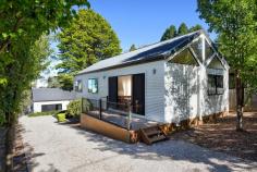  151 Hat Hill Road Blackheath NSW 2785 $895,000 - $950,000 Capturing the essence of contemporary mountain living, this thoughtfully designed property offers a seamless blend of style and practicality across two separate buildings. Ideally located just 1.8km from village amenities, it provides the perfect balance of privacy and convenience. The build features sleek Colorbond exteriors, complemented by bamboo flooring, neutral tones, and an abundance of natural light throughout. Vaulted ceilings and double-glazed windows enhance the sense of space and energy efficiency throughout. The approved rear studio offers a flexible space - ideal as guest retreat, home office, yoga space, or creative studio. This property, with its attractive aesthetic, is definitely worth adding to your priority viewing list. Breakdown of Features: Three spacious bedrooms, all with built-in wardrobes Bamboo flooring in living areas and carpeted bedrooms Naturally light-filled open plan living room with north facing aspect Flued gas heating and reverse cycle air conditioning for all year-round comfort Spacious studio with versatile guest/office/recreational space; separate bathroom Off street parking for 3 cars; practical under house storage Low maintenance block with level garden areas - perfect for busy lifestyles Convenient access to public transport and local bush walks; 1.8km to village 