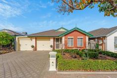  28 Kensington St Clovelly Park SA 5042 Just a few hundred metres from multiple local reserves, this charming '90's family home is presented to perfection. Manicured gardens and a classic façade combine for lovely street appeal, while a formal entry offers easy access to a front positioned master bedroom with walk-in robe, northerly aspect natural light and two-way ensuite bathroom. A further two bedrooms also enjoy easy access to the shared facilities including a convenient separate toilet and powder room. At the rear, a well-designed U-shaped kitchen with shaker-style cabinetry includes a large pantry and excellent bench space, as well as a lovely outlook over a dining and living space onto the pristine backyard. Sliding doors from here open onto an inviting alfresco entertaining area under the protection of an expansive pitched roof pergola where a lawn space and manicured hedges make a lovely backdrop, and an additional open paved area with espaliered citrus borders offers the perfect spot for enjoying fine weather. The finer points: - Ducted reverse cycle air conditioning - Ceilings fans to all bedrooms + living & dining - Separate laundry with outside access - Double garage with rear access + extra driveway parking - Large rear shed with power Walk to Kensington Street and Graham Watts Reserves and the bus, with Mitchell Park Oval, the train, Clovelly Park Primary School and Tonsley precinct all just around the corner, and Pasadena and Westfield Marion Shopping Centres, the beach and the CBD all easily accessible. A beautiful family home, there's lots to love about this one. 