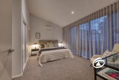  29 Willowdene Way Berwick VIC 3806 $1,050,000 - $1,150,000 Sophisticated Style, Steps from Berwick Village Positioned within the prestigious and architecturally designed Hark complex, this as new tri-level townhouse offers an exceptional fusion of modern elegance, premium finishes, and low-maintenance living — all within just 500 metres of the vibrant Berwick Village. Designed with both comfort and functionality in mind, the home features three spacious bedrooms, each thoughtfully appointed with ample storage. The master suite is privately situated on the lower level, creating a tranquil retreat complete with a sleek ensuite and a generous walk-in robe. The upper level unveils the heart of the home — a light-filled, open-plan living and dining domain that flows effortlessly onto a private balcony with elevated park views. At the centre is a beautifully appointed kitchen showcasing stone benchtops, premium stainless-steel appliances, a walk-in pantry, and an integrated dishwasher. This space is equally suited to casual daily living and elegant entertaining. Throughout the home, split system heating and cooling in every room ensure year-round comfort, while the double remote garage with internal access adds both security and convenience. Professionally landscaped, low-maintenance gardens complete the picture, allowing you to enjoy the lifestyle without the upkeep. High ceilings and refined contemporary finishes elevate the overall aesthetic, offering a sense of space, sophistication, and ease. Ideal for professionals, downsizers, or discerning investors, this impeccable residence offers a rare opportunity to secure a stylish, turn-key property in one of Berwick’s most sought-after addresses. With boutique cafés, restaurants, shopping, and public transport just a short stroll away, you’ll enjoy the perfect blend of cosmopolitan living and suburban tranquility. 