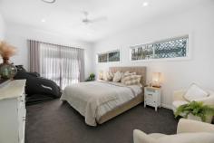  64 Tabilban Street Burleigh Heads QLD 4220 $2,095,000Perfectly positioned opposite tranquil parklands and just a short stroll to the calm, crystal-clear waters of Tallebudgera Creek, 64 Tabilban Street offers the ultimate in relaxed Gold Coast living. This impeccably renovated coastal residence delivers an exceptional lifestyle opportunity for families seeking space, flexibility, and proximity to Burleigh's iconic natural and cultural attractions. A True Family Sanctuary: Set on a generous, flat 736m² block, this beautifully appointed home caters effortlessly to modern family life. The main residence boasts five spacious bedrooms, including a luxurious master suite with walk-in robe and private ensuite. What truly sets this property apart is the detached poolside retreat, fully self-contained with its own kitchenette, bathroom, and separate entrance — the ideal setup for multi-generational living, a teenager's haven, or a private work-from-home office. Effortless Entertaining & Everyday Comfort: The heart of the home is the expansive open-plan kitchen, dining, and living area, seamlessly flowing outdoors to a private tropical oasis. A gourmet kitchen with a butler's pantry, stainless steel industrial oven, gas cooktop, and pass-through window makes entertaining a breeze. Step outside to discover a resort-style pool with waterfalls, a fountain system, and ambient lighting — all framed by lush, low-maintenance gardens and a leafy, tranquil outlook that ensures privacy and serenity. Property Features at a Glance: Unbeatable location – moments to Tallebudgera Creek, parklands, and Burleigh Head's famed beaches & dining precinct Short bike ride to James Street, boutique cafes, and vibrant Burleigh village life Five generous bedrooms in the main residence, plus a dedicated study nook Detached poolside retreat with kitchenette, shower, and toilet Designer kitchen with butler's pantry and stainless-steel gas appliances Polished timber floors, ducted air-conditioning, and ceiling fans throughout Two light-filled living zones perfect for families of all ages In-ground resort pool with waterfall features, lighting, and tropical surrounds Spacious entertainer's patio and large, fully fenced backyard Off-street parking for multiple vehicles, boat, caravan, or jet ski Close to schools, public transport, Stockland Shopping Centre, and more If your family is ready to embrace the laidback, world-renowned Gold Coast lifestyle, you do not want to miss this one! 