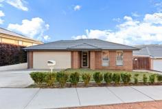  23 Kubbadang Street Ngunnawal ACT 2913 Presenting an exciting opportunity for you to call this lovely property home. Positioned in a quiet street, opposite a green belt, offering a lovely leafy outlook in the family friendly suburb of Ngunnawal. Welcomed by cosy interiors and a functional open plan layout. It is evident that this home will be enjoyed most by those who love to entertain. Capturing stunning views of one tree hill from the main living space and backyard. The layout offers spacious formal and informal living areas, featuring a theater room and entertainer's kitchen at the heart of the home. Complete with extensive storage, bench space and quality finishes. Ideal for those who cook, bake or cocktail make. All four bedrooms are a good size, with a generous master suite including walk-in robe and ensuite. Complementing the lovely indoor living is the homes' immaculate outdoor entertaining area, including a gorgeous covered entertaining space, including outdoor kitchen and family friendly yard. Complete with double garage, currently offering one car space and a converted space that offers an extension of the internal living space that you can make your own. Additional parking options available with wide block frontage, there is room for cars or even a tailor, boat or caravan. As the new owner of this lovely home you will enjoy all the conveniences of the wonderful suburb of Ngunnawal. Within close proximity to local bike paths, walking tracks and the Kubbadang Street Playground is just up the road. As well as the popular Ngunnawal Primary, Ngunnawal Sports Ground, Ngunnawal Village Shopping Centre and The Marketplace, Gungahlin within a short drive. Perfectly positioned in Ngunnawal is this lovely family home Set in a quiet street and opposite green belt, offering a lovely leafy outlook Presenting a functional and flexible family friendly floorplan All bedrooms are a nice size and include carpets and built-in robes Primary bedroom suite includes walk-in robe and ensuite Main bathroom includes bathtub and separate toilet Kitchen has modern finishes, quality appliances and great storage Lovely living spaces include, family, dining and lounge room Theater room includes speakers and projector installed Laundry room has good storage and external access Ducted gas heating and evaporative cooling throughout Covered outdoor entertaining area features outdoor kitchen and overlooks the backyard Lovely easy care gardens, fully fenced to the rear great for families with children or pets Double garage currently offers one car space and a converted space that is an extension of the internal living space, great for a gym, studio or study Additional parking options available with wide block frontage, there is room for cars or even a tailor, boat or caravan Local Kubbadang Street Playground is just down the road A short drive to Ngunnawal's amenities or into Casey and Gungahlin itself 