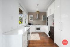  1/19 Azalea Avenue Coffs Harbour NSW 2450 Positioned in one of Coffs Harbour's most convenient pockets, this solid three-bedroom home offers exceptional value and lifestyle appeal. Just a short stroll to the CBD, pubs, restaurants, clubs, sporting fields and tennis courts, this location truly ticks all the boxes. Inside, the home is neat and comfortable, with a functional layout suited to family living or low-maintenance investing. The kitchen, complete with a gas cooktop and dishwasher, enjoys a leafy outlook to the rear garden, while the adjoining dining area opens to a covered entertaining space - perfect for casual gatherings or weekend barbecues. The generous living room retains character touches like original French doors that lead out to the front porch. Timber floors throughout add warmth and charm, and the updated bathroom and laundry provide everyday convenience. A single lock-up garage with internal access is complemented by additional off-street parking for a boat, caravan or trailer on the level front yard. With reliable tenants currently in place, this is a fantastic opportunity to secure a smart investment. Equally appealing for first home buyers ready to step into the market in a well-connected and thriving part of town. 