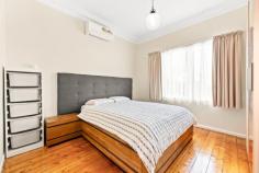  7 Hatton Grove Coburg VIC 3058 $1,180,000 - $1,280,000 Set in a quiet cul-de-sac and brimming with original character, this circa 1924 double-fronted Californian Bungalow offers a rare blend of heritage appeal and inner-city convenience. Proudly held by the same family for over 50 years, the home sits on a wide allotment just metres from the vibrant heart of Sydney Road's shops, cafés and trams. Freshly painted and immaculately presented, the home features manicured hedged gardens, soaring decorative ceilings with rosettes, polished Baltic pine floors, and a flexible layout comprising two generous bedrooms plus a study or optional third bedroom. Comfortable as is, yet offering outstanding potential to renovate or extend (STCA), the current floorplan includes a spacious lounge, separate dining room, gas-appointed kitchen, central bathroom and a sunroom that opens to a large, private backyard with a desirable northerly aspect. Additional highlights include gas heating, air conditioning, and a full side driveway leading to a double carport at the rear. Ideally located close to Coburg Lake, Merri Creek trails and market gardens, schools, John Fawkner Hospital, and just moments to trains and the CBD. 