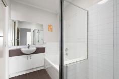  6/34 Coral Street Frankston VIC 3199 $570,000 - $627,000 Embrace the essence of modern living in this well-loved two-bedroom unit, nestled privately within an exclusive community just moments away from great coffee and serene local parks. Featuring modern finishes and thoughtful conveniences throughout a seamless floorplan, the home offers a secure and inviting sanctuary for those looking to downsize without compromising on quality. A hassle-free living experience awaits beyond an appealing facade, revealing low-maintenance courtyard gardens and private interiors awash in natural light. Generous proportions embrace an open-plan living and dining space where a neutral colour palette merges with a well-appointed kitchen complete with Westinghouse appliances, a dual sink, and ample cabinetry. A central bathroom with direct ensuite access from the master bedroom, serves both family and friends, while additional features include a separate powder room, dedicated laundry, a split-system heating/cooling unit, a covered patio with low-maintenance surroundings, water tank, and single garage. With a central address close to public transport, schools, everyday retail, and Frankston's vibrant CBD, this private residence welcomes those seeking security and peace-of-mind in an area known for its friendly community and convenient position. 
