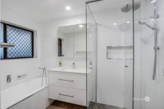  203 Ashmole Rd Newport QLD 4020 Conveniently located in the Dolphins Leagues precinct, super close to the waterfront and quality Schools, this stunning family home has been lovingly renovated and is ready and waiting for you to move right in! The home features a perfect balance of contemporary charm and will suit a family that loves to entertain. Designated living and entertaining spaces seamlessly connect to create a versatile floor plan that caters to the entire family, combining chic interior design, quality workmanship and crisp neutral tones. - Family / Dining room opens out to the North facing entertaining area and back yard. - The Kitchen features stone tops, quality cabinetry and appliances and interacts well with the Dining room and Entertaining Patio. - Full size formal lounge is a peaceful place to unwind and opens out to the Patio also. - A private home office - perfect for the work-from-home professionals or Kid's homework. - The home features a smart bedroom placement design to suite a wide variety of families, with 2 bedrooms down one end and the large Master suite and 4th bedroom in the Eastern wing. - The Master suite is spacious and opens out to the expansive North facing patio, it features a Walk-in Robe and recently renovated Ensuite in perfect condition. - The recently renovated family bathroom would look right at home on the cover of Vogue Living. - Full-size family laundry. - The home features ample car storage for the whole family - 2 car lock-up garage with new roller doors and 2 off street spaces. HOUSE EXTRAS: - Brand new paint front to back - in and out. - Re-pointed roof and updated guttering. - Solar System. - Downlights throughout. - Ducted Air-conditioning. - Fully fenced and landscaped yard. - Fire-pit area out the back is a great place to entertain friends and family in the winter. - Plenty of room out the back or even the North side for an in-ground pool. WALK TO: - Dolphins Leagues Club and Coles - 5-7min - Public Transport - 2.5minT - Local parks - 2-3min - Waterfront - 5-10min - Several quality Schools (Redcliffe State High, Southern Cross Catholic College, Scarborough State School.) DRIVE TO: - Brisbane Airport - 25-30min - Brisbane CBD - 35-40min - Redcliffe Waterfront Cafe Strip - 3-6min - Westfield North Lakes - 14-16min 