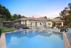  32 Dungogie Drive Tallebudgera QLD 4228 $2,895,000 If you're seeking space, serenity and style within a tranquil, tree-lined setting, this is the residence you've been waiting for! Set well back from the street on a 4,991m2 block, it's designed for effortless living and entertaining. Sprawling across a light-filled floorplan, timber floors bring warmth to the sophisticated interiors, which includes a sleek kitchen with a waterfall-edge stone island and abundant storage. Anchoring the open plan family zone, it spills onto an expansive alfresco deck via bifold doors, while a lounge with a cosy fireplace gazes upon poolside views. Elegance and space also intertwine in the master suite, boasting exterior access, an oversized ensuite, and skylit walk-in robe. Three additional bedrooms with built-in robes are serviced by a tasteful main bathroom, creating a functional layout that supports growing families. Outside, the expansive alfresco deck will be a popular place to congregate. Capturing a lush and leafy outlook, it's an ideal sanctuary for relaxing or hosting guests. There's ample room to roam outdoors too, with a landscape of towering trees and established gardens punctuating the usable land. And after the adventures are done, cool off in the saltwater pool. Additionally, parking is plentiful, thanks to a triple garage and a powered 9m x 7m shed that features a handy workshop and 2m covered patio. Tucked away in the tightly held "'Tallebudgera Park"' Estate, take advantage of a semi-rural lifestyle that doesn't compromise on proximity to conveniences. Local shops, services and Tallebudgera State School await in approx. 2 minutes by car, and you can feel the sand beneath your feet at Palm Beach or Burleigh in approx. 11 minutes. Don't miss the chance to secure a peaceful property that promises contemporary comfort. Arrange an inspection today. House Features: Sophisticated family oasis within a tree-lined, tranquil paradise Sleek and stylish interiors warmed with timber floors Modern kitchen with waterfall-edge stone island bench, large double sink with stainless steel tapware, dual dishwasher drawers, gas cooktop and ample storage Family room adjoins kitchen, seamlessly flows onto the alfresco deck via bifold doors Separate dining zone with stunning pendant lighting Lounge room with cosy fireplace and pool views Spacious master suite includes external access, an oversized ensuite with bath, rain shower head plus a walk-in robe with skylight Bedrooms 2, 3 and 4 with built-in robes Main bathroom features a large shower, vanity, and separate toilet Expansive alfresco entertaining deck enjoys a lush and leafy outlook Saltwater pool overlooks a canopy of natural greenery Triple garage with 15 amp plug and workshop/multipurpose area Laundry with stone benches, sink, storage and outdoor access Split system air-conditioning units and ceiling fans Crimsafe screens throughout Property Features: 4991m2 block comprising vast usable land, towering trees and established gardens Set well back from the street for enhanced peace and privacy Accessed via a long driveway 9m x 7m work shed with 2m wide covered patio, workshop, 3 phase power and room to park another two cars 3m x 3m garden shed Lockable pool pumphouse Outdoor sensor lighting 5,000 gallon Water Tank Location: Approx. 2 mins to Tallebudgera State School and shops Approx. 5 mins to St. Andrew's Lutheran College Approx. 11 mins to Burleigh Heads Approx. 11 mins to Palm Beach Approx. 14 mins to Currumbin Beach Approx. 19 mins to Gold Coast Airport Approx. 31 mins to Surfers Paradise 