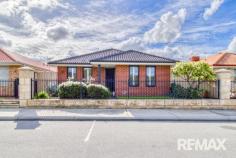  16 Dorrigo Bend Yanchep WA 6035 $600,000 Nestled on an elevated 347m² block in the serene coastal suburb of Yanchep, 16 Dorrigo Bend presents a meticulously maintained Federation-style residence that seamlessly blends timeless charm with modern comfort. This home offers a tranquil outlook and a lifestyle of convenience, being just moments away from pristine beaches, reputable schools, and a variety of shopping options. Upon entry, you’re greeted by a spacious master bedroom featuring plantation shutters, plush carpeting, a walk-in robe, and a split system air conditioner, creating a private retreat. The master also boasts an ensuite complete with a vanity, WC, and shower for added comfort and convenience. The double-door theatre room, adorned with matching shutters and soft carpets, provides an ideal space for family movie nights or entertaining guests. The home’s open-plan living and dining area is bathed in natural light, accentuated by plantation shutters throughout and a second split system for year-round comfort. The kitchen is a culinary delight, equipped with a 900mm oven, a five-burner gas cooktop, a walk-in pantry, a double-door fridge recess, and ample bench space with laminate tops, catering to both everyday meals and gourmet creations. Accommodation includes two additional double-sized bedrooms, each with plantation shutters and built-in robes, one of which is at the front of the home and offers versatility as a study or guest room. The modern family bathroom features a single vanity and a separate bath and shower, complemented by a double-door linen cupboard in the passage for additional storage. The spacious laundry provides direct access to the double garage via a shopper’s entry, enhancing daily convenience. Outside, the paved alfresco area invites outdoor dining and relaxation, overlooking an easy-care garden with artificial lawn bordered by garden beds and side paving, perfect for low-maintenance living. Located within close proximity to Yanchep Beach Primary School, Yanchep Secondary College, and the Yanchep Central Shopping Centre, this home offers both comfort and accessibility. The newly completed Yanchep Train station is a short 5 minute drive and the Freeway extension to Romeo Drive makes the coastal region of Yanchep so much more assessable. Experience the perfect blend of classic elegance and modern living in this exceptional Federation-style residence. 