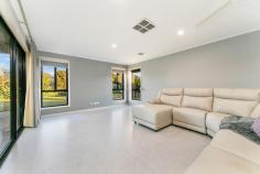 15 Claret Avenue Virginia SA 5120 Nestled in the heart of Virginia, 15 Claret Avenue offers the perfect blend of comfort, convenience, and family living, making it an ideal retreat for those seeking space and modern amenities. Virginia, just a short 35-minute drive from the city and with easy access to Port Adelaide, Semaphore, and the scenic Copper Coast, offers a lifestyle that's both peaceful and practical.. Designed with families in mind, this home boasts a spacious 4-bedroom plus study layout, ensuring there's room for everyone. The master suite is a true retreat, complete with a his-and-hers ensuite with bath and a spacious walk-in robe. Bedrooms 2 and 3 feature built-in robes, making storage effortless and bedroom 4 with access to the alfresco. The flow of natural light throughout the home adds to its inviting atmosphere, and the cool tones enhance the overall contemporary appeal. For families who enjoy both private and communal spaces, this home has been thoughtfully designed with an abundance of living areas. A separate formal lounge provides a perfect parents retreat, while the open-plan living area is ideal for entertaining, featuring a well-appointed kitchen, meals area, and additional family or games room.. This space is versatile, whether it's a spot for the kids to play or a space to host friends over a pool table. The kitchen complete with a large L-Shape island breakfast bar, overhead cupboards, a 900mm oven and 5-burner stove, a dishwasher and a spacious pantry - perfect for those who love to cook or entertain. This home continues to impress with its exceptional storage options and modern comforts, including roller shutters, ceiling fans and ducted gas heating and ducted evaporative cooling to ensure year-round comfort. Outside, the property shines even brighter, offering a substantial 1200 sqm allotment that truly has something for everyone. The large alfresco entertaining area under main roof is designed for outdoor living, featuring weather blinds and ceiling fans, ideal for enjoying long evenings with family and friends. For those with hobbies or the handyman of the household, the property also includes a a double garage UMR with an electric tilt door with PA door to the rear garden and one to the internals of the home. A large 4 car 5.4m x 5.8m colorbond garage complete with power and concrete flooring with sliding doors to the front and rear - perfect for any project or additional storage needs. In addition, there are lockable gates on 2 separate areas allowing ample secure storage for a caravan and trailer, still with ample off street parking facilities. The kids and family pets will have plenty of space to run and play on the large lawn area, and with the addition of a vegetable patch and fruit trees, you'll have everything you need to live sustainably. Multiple rain water tanks offering over 40,000 litres of additional water supply with Davey pumps ensure that maintaining the beautiful landscape is a breeze. The outstanding infrastructure doesn't stop here!! The in ground salt chlorinated, fibreglass swimming pool is surrounded by quality paving that has an area that will accommodate your table and chairs behind pool regulated fencing. The pool is also supplied by 2 rain water tanks (one being 5,000L the other 1,000L) offering a leisure lifestyle for all ages of the family. To top it all off, the home is powered by a 5kw solar system, helping to reduce energy bills and contribute to a more eco-friendly lifestyle. What we love: Executive residence - 4 good size bedrooms Study Master with his and hers ensuite, bath and large walk in robe Bedrooms 2 and 3 with built in robes Bedroom 4 with access to alfresco Open plan kitchen, meals living and family room Separate formal lounge room Modern bathroom and laundry Ducted evaporative cooling and ducted gas heating 5kw Solar Power Under main roof alfresco entertaining area Roller shutters 5.4m x 5.8m workshop with concrete floor, power and rear access Established gardens Double carport with roller door Salt chlorinated inground pool Rain water tanks Side driveway with side gates With its combination of practicality, space, and extensive infrastructure, 15 Claret Avenue offers an exceptional opportunity for those looking to enjoy the best of family living in the heart of Virginia. Whether you're working from home, entertaining guests or simply enjoying time with the family, this home has everything you need and more. 