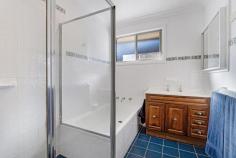  15 Surrey Avenue Georges Hall NSW 2198 Set on a 594m2 block with a 15m+ width at the building line, this well-maintained brick home is ideal for first home buyers or investors alike. Located on the high side of the street, there are no easements on the land, and the sewer main runs close to the rear boundary, which means it doesn't interfere with anything you may wish to build in the future. This home offers four large bedrooms and a spacious open-plan lounge and dining area. The kitchen is an elegant, solid timber design with stainless steel appliances. The bathroom has been updated, and there is a separate shower and bathtub, and a separate toilet nearby. A driveway on the right-hand side gives access to a massive basement area with a three-car lock-up garage, a big workshop, and heaps of storage space. The basement area could easily be converted into a granny flat, or you could build a granny flat in the backyard, or do both (all STCA). There is off-street parking for another two vehicles in the driveway. The laundry is full-sized and positioned at the rear of the house. This is a great first home or investment, and a great position to build your dream home in the future, or build a duplex (STCA). Don't miss out on this great opportunity.  
