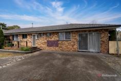  1/50 O'Connor Road Armidale NSW 2350 $440,000 - $480,000 Situated in the highly sought-after South Hill location, this spacious four-bedroom unit offers the perfect blend of comfort, convenience, and low-maintenance living. Whether you’re looking to enter the market or add a solid investment to your portfolio, this property is a smart choice. Inside, the unit features four generously sized bedrooms—two with built-in robes and the master complete with a walk-in robe and private ensuite. A second central bathroom with a separate toilet ensures functionality for families or shared living. The expansive living area, warmed by wood heating, flows seamlessly into the dining space and well-equipped kitchen, which boasts ample cupboard storage, a walk-in pantry, dishwasher, and room for a large fridge. Step outside to an impressive undercover entertaining area—ideal for gatherings and relaxing outdoors—while the property also offers ample off-street parking for your convenience. Don’t miss this opportunity to secure a quality home in a premium Armidale location. 