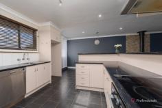  1/50 O'Connor Road Armidale NSW 2350 $440,000 - $480,000 Situated in the highly sought-after South Hill location, this spacious four-bedroom unit offers the perfect blend of comfort, convenience, and low-maintenance living. Whether you’re looking to enter the market or add a solid investment to your portfolio, this property is a smart choice. Inside, the unit features four generously sized bedrooms—two with built-in robes and the master complete with a walk-in robe and private ensuite. A second central bathroom with a separate toilet ensures functionality for families or shared living. The expansive living area, warmed by wood heating, flows seamlessly into the dining space and well-equipped kitchen, which boasts ample cupboard storage, a walk-in pantry, dishwasher, and room for a large fridge. Step outside to an impressive undercover entertaining area—ideal for gatherings and relaxing outdoors—while the property also offers ample off-street parking for your convenience. Don’t miss this opportunity to secure a quality home in a premium Armidale location. 