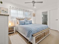  36 Fernvale Road Brassall QLD 4305 $1,150,000 Set back from the street on an expansive 1,052m² block, this beautifully presented four bedroom brick home is a rare find in today's market. Built in 2022 and still in immaculate condition, it offers all the benefits of a brand-new build, without the wait, stress, or compromises of construction. Homes of this calibre on large blocks are increasingly hard to come by, making this a unique opportunity to secure space, quality, and comfort in one move-in-ready package. Inside, you'll find: Master bedroom with walk-in robe, ensuite and ceiling fan Three additional bedrooms, each with built-in robes and ceiling fans Two double-door storage/linen closets Main bathroom with bathtub and separate toilet Laundry room with bench, external access, and additional storage Open plan kitchen and living area, perfect for modern lifestyles Ceiling fans throughout for year-round comfort Air conditioning Double lock-up garage with internal access Crimsafe security screens for peace of mind, with tinted windows Built in 2022 with a durable steel frame Step outside and enjoy: 6m x 6m shed with double roller doors (3.6m clearance) for all your storage or workshop needs, plus side access Outdoor covered patio extended to accommodate a spa or large entertaining setup Manicured and landscaped gardens Fully fenced front and back yard with gated entry, safe for pets and kids Plenty of space for a pool without sacrificing on yard Solar power 17 x 240w panels and 5KW inverter Location Highlights * • 2 minutes to Ipswich State High & Brassall Primary School • 2 minutes to a brand-new Woolworths at Emerald Hill, Brassall (build in progress) • 2 minutes to Warrego Highway (Brisbane to Toowoomba access) • 3 minutes to Brassall Shopping Centre with Aldi & Woolworths • 7 minutes to Riverlink Shopping Centre • 9 minutes to Ipswich CBD & Hospitals • 35 minutes to Brisbane CBD (*All distances approximate) This home is perfect for families looking to upsize without compromising convenience, downsizers wanting a low-maintenance yet spacious property, or owner occupiers searching for that rare combination of a modern build on a full-sized block. With a park-like setting, a large shed, and no work needed, all that's left to do is turn the key and settle into your new lifestyle. 