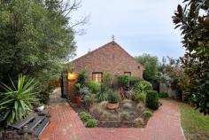  21 Bruarong Crescent Frankston South VIC 3199 $1,700,000 - $1,870,000 A distinguished Olivers Hill setting on an expansive 977sqm (approx.) allotment showcases the beauty and space of 'Narrawong', a meticulously presented four-bedroom plus bungalow residence beautifully transformed for today's modern lifestyle. Sweeping bay views that meet with Mount Dandenong reflect the prestigious nature of this generous family home, set within the Frankston High School Zone, and only a short walk from Frankston Beach. Complementing the crisp air of a winter morning, a gas log fireplace and ducted heating bring comfort to dual living zones, a light-filled dining space with attic storage, and a well-appointed stone-finished kitchen, complete with European appliances including double pyrolytic wall ovens, an induction cooktop, and a dual-drawer dishwasher. A north-facing balcony entices entertaining outside, where below, landscaped gardens cradle an alfresco deck with above-ground spa, and private bungalow with space for remote work, teenager's retreat or a service-based business (STCA). Gracefully cascading across both levels, four inviting bedrooms and two well-appointed bathrooms that promise a haven of comfort. At the heart of it all lies the lower-level master suite, where a separate parent's retreat complements a newly transformed ensuite with dual vanity, a walk-in shower, and a heated towel rail. Finalising with original leadlight detailing, timber wall panelling, ceiling fans, split-system air conditioning, a garden shed, an oversized double garage and lush landscaped gardens. Set within moments of Mount Eliza Village, Frankston Hospital, Sweetwater Creek Reserve, Bayside Shopping Centre, and public transport. 