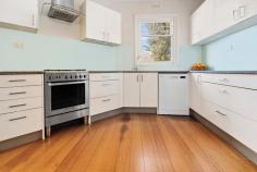  2/1154 Frankston-Flinders Road Somerville VIC 3912 $550,000 - $600,000 The perfect position where convenience meets community Radiating the classic charm of the fabulous 50s, this beautifully updated three-bedroom cottage gracefully caters to the demands of modern life. It effortlessly intertwines a touch of Art Deco elegance with a practical living experience, all nestled on the outskirts of Somerville's bustling retail centre. Tucked away in a three-lot subdivision without Body Corporate limitations, this charming home greets you with bright, sunlit interiors highlighted by the warm beauty of solid timber floors. A central hallway elegantly separates the living spaces from the entertaining areas, while the cozy crackle of an open fireplace beautifully defines the distinction between the living and dining zones. An updated kitchen with a freestanding dual-fuel cooker, dishwasher and feature circular sink ensures everyday cooking is effortless, while a rear main bathroom complements with a contemporary design. Three bedrooms, including the master, provide comfortable accommodation for family or guests, while additional features include sun-drenched deck and covered verandah, a dedicated laundry, reverse-cycle heating and cooling throughout, solar power, a rear garden shed, and two parking bays. Set within an easy walk of Somerville Plaza, Vesbar, Somerville Recreational Reserve, and Somerville Train Station. 