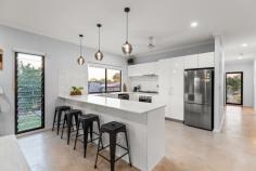  24 Cajuput Crescent Djugun WA 6725 $775,000 Are you dreaming of building the perfect forever home for you and your family? Why wait when we've got it right here waiting for you? Constructed in 2021 and presented near, this stunning 3 bed, 2 bath home is the definition of modern, stylish, low-maintenance living. Perfectly positioned in sought-after Roebuck Estate, with a gorgeous park vista, this is where location meets lifestyle with relaxed, laid-back living within reach of everything Broome has to offer. From the front, the home boasts great street appeal thanks to the beautifully manicured lawn and gardens and feature wood panel fencing. The double carport has room for two vehicles with additional driveway parking and double gated side access to secure rock parking for your boat/caravan/trailer. Inside is simply sublime with spacious flow-through living and dining areas with feature concrete flooring, louvre windows and plenty of natural light. The huge open kitchen is sure to impress with feature hanging lights, white gloss cabinetry, stainless steel appliances, feature tiled splashbacks and wonderful garden views. Other key features include the modern main bathroom with separate shower and bath, European laundry, air-conditioning, ceiling fans, modern downlights, window blinds and more. The home itself boasts 3 big bedrooms, all with built-in robes, air-con and ceiling fans, including the magnificent master retreat with big WIR and modern private ensuite with corner bath. Beautifully crafted both inside and out, the expansive paved undercover alfresco with timber lined ceiling is purpose-built for entertaining, overlooking the fully-shaded below-ground pool and low-maintenance rear yard. There's plenty of lush green grass for the kids and pets to play and a large lock-up shed for all your tools and toys. Located just a 2-minute drive from Chinatown and close to parks, shops, schools and the beach, it's the perfect home to start or raise a family 