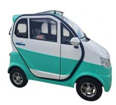  A sleek Fully Enclosed Mobility Scooter is parked on a scenic path surrounded by autumn trees, its glossy exterior reflecting the golden leaves. The modern design features clear, wraparound windows and weatherproof panels, offering full protection from the elements. Inside, a comfortable seat and intuitive controls are visible, emphasizing convenience and safety. A bold banner across the top reads: "Fully Enclosed Mobility Scooter – All-Weather Freedom Awaits". At the bottom corner, a highlighted call-to-action says: “Explore the best Mobility Scooters For Sale today!” — inviting viewers to imagine year-round mobility in comfort and style. 