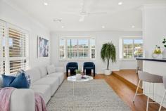  76 Waratah Street Windang NSW 2528 $1,290,000 A dream home that anyone would be lucky to call their own, this beautifully presented four-bedroom property is proudly set on a level block in a quiet, family-friendly location. With a timeless canvas, complemented by tasteful plantation shutters, ducted air conditioning and floorboards throughout this light-filled residence offers an oversized gourmet kitchen with ample storage, a fridge drawer and a duo oven with inbuilt grill. The main bedroom is a true sanctuary, boasting a walk-in wardrobe and a recently renovated ensuite, while the recessed lounge room and separate dining area create an inviting setting for effortless family living and entertaining. Step outside and discover a fully fenced, low-maintenance backyard with a seamless mix of decking and grass, designed for both relaxation and connection with endless opportunities to maximise every square inch of space. Adding to the appeal, the tandem garage offers secure parking for two vehicles with enough room leftover for bikes, tools, or weekend adventure gear. level block, tandem garage main bedroom with WIR, ensuite plantation shutters, ducted a/c recently renovated bathrooms cosy backyard, internal laundry 