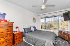  63 Lynch Street Adelong NSW 2729 $720,000 Set on the high side of the street, offering an expansive floorplan both inside and out and multiple entertaining options, you will love the space on offer in this family entertainer. Boasting four great size bedrooms, large sun filtered living and dining area with direct access to the front deck, double lock garage under the home and a large covered rear entertaining area with inground swimming pool and spa. 63 Lynch Street is an opportunity not to be missed, call today to book your inspection! Premiere Features: - Four great size bedrooms with ceiling fans and the master boasting built in robes - Large bathroom with single vanity, shower and toilet - Kitchen positioned to the rear of the home and boasting ample bench space and storage options, electric cooktop, wall oven, dishwasher, double sink overlooking the rear yard and direct external access - Sun filtered living and dining area with direct access to the front deck - Internal laundry with second shower and toilet and direct external access - Formal entry - Ducted reverse cycle air conditioning throughout - Fully covered front deck with expansive views - Double lock up garage located under the home with ample space for storage or work bench - Fully fenced and paved inground swimming pool and spa with a new fully integrated cleaning system - Large covered outdoor entertaining area with ceiling fan, cabinetry and sauna, perfect for entertaining all year round - Fully fenced rear yard - External blinds - Solar power connected - Walking distance to schools - Approximate 1,012m² allotment Do not miss your opportunity to secure this four bedroom family home with entertaining at the heart of the design. 