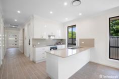  15 Madgwick Drive Armidale NSW 2350 $700,000-$770,000 The hard work has already been done for you! We rarely get a property like this gem, on our books. An outstanding opportunity awaits at 15 Madgwick Drive where you will find a large 1,331m² block offering a modern 4 bedroom home and, with DA approval permission to subdivide into two lots. Excellent prospects for return on your investment. Fully fenced and perfectly positioned within walking distance to the popular University of New England this beautiful property offers you choice: •Use the existing DA approval to subdivide and build a second home. •Don’t subdivide and simply build a granny flat for your adult kids or parents to live near you. •Live in the home and enjoy your generous yard and dual driveway access to store your caravan, boat, trailer, or tradie trucks. Set on the existing title the modern four-bedroom home is already tenanted, providing immediate rental income while you plan your next move. The existing home offers an open-plan light filled kitchen, living and dining, complimented by a second living/media or home office. Sleek timber look tiles throughout living areas and seamlessly extend to the alfresco dining area. This home has all the features you would expect for modern living including: •2.7m high ceilings throughout •stone benchtops and splashbacks •soft close kitchen cupboards and drawers with integrated bin •full height tiling and tiled niches to both bathrooms •freestanding bath, floating vanities with stone tops •1200mm wide feature entry door and contemporary internal doors, •built in wardrobes to all rooms •ducted air-conditioning •solar panels •electric car charger •downlights throughout •contemporary façade with random stone features •north facing alfresco •neutral colour palette With room to develop further on the site, this is an exciting proposition for developers, investors, or those looking to secure a future-proof property in a high-demand location. Subdivide, expand, or simply enjoy the strong returns from the existing dwelling. 