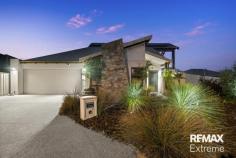  38 Bulburin Parade Yanchep WA 6035 Introducing a one-of-a-kind home where cutting-edge sustainability meets modern comfort. Thoughtfully designed and exceptionally equipped, this property boasts a powerful 10kW solar system paired with 10kW batteries, an EV charger, and 9,600L of rainwater storage — dramatically reducing utility bills. With double-glazed windows, wall insulation, and 3-phase electricity, every detail has been considered to deliver energy efficiency without compromising on style or convenience. Built by the award winning ‘Rural Building Company’, this is a once in a lifetime opportunity to acquire a truly exceptional & special property that was featured in the Saturday West Australian New Homes Section. Features & Benefits Include: * Striking contemporary architecture with a unique design featuring natural stone walls, clean modern lines & a thoughtfully planned, multi-level layout that maximises space * Dedicated home theatre with screen & projector * Gourmet kitchen with stone bench tops, island bench with waterfall ends, stainless steel appliances including dishwasher, feature under-cabinet lighting, double fridge/freezer recess with cold water feed & scullery with fridge/freezer recess, power points & an abundance of cupboard & shelving space for the discerning chef * Open plan family & meals areas with soaring high ceiling & large ceiling fan * The master bedroom opens up to the outdoors, giving access to a decked courtyard with a vergola style patio with café blinds creating a versatile space that can be used year-round. The master bedroom also benefits from a hotel style ensuite with dual vanities, walk in shower & WC * 2 further spacious bedrooms feature sliding door robes * Study/4th bedroom * Family bathroom with shower, vanity & bath * 2nd WC * Generous sized laundry with sliding door linen storage & under-bench cupboards * Upstairs is a further living area, perfect for a games area, kids or parents retreat, with access to a decked balcony * Reverse cycle, zoned air conditioning throughout for year-round comfort * Rich timber flooring * Plantation shutters * Double glazed windows * In-wall insulation * 10kW solar with 10kW battery storage * Multiple water tanks (9,600L) * 3 phase power * EV Charger * CCTV * Intercom system at front door * Alarm system * Decked, outdoor entertainment area with café blinds creating yet another versatile area for year-round use * Stunning, heated, below ground concrete pool with blade water feature, spa & illuminated octopus artwork * Glass pool fencing * Outdoor shower * Double, remote garage with workshop area & access to under stair storage * Side access * 520sqm block * Close to parks, schools, Yanchep Train Station, Yanchep Central & surrounding shops, Yanchep Lagoon & all other local amenities 