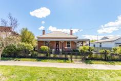  59 Merivale Street Tumut NSW 2720 $509,000 Positioned in the heart of town, 59 Merivale exudes street appeal and traditionalist charm. Boasting both high pressed metal ceilings and VJ timber feature ceilings throughout, ornate cornicing, timber picture railings and a wraparound bullnose verandah, you will love calling this character filled house your home. Comprising of three very generous sized bedrooms, formal lounge and a perfectly appointed kitchen with pass to dining, that flows effortlessly through French timber doors to your very private and fully covered entertainers' deck. 59 Merivale Street is zoned commercial, which does allow for change of use, should you be wishing to have the flexibility of running a business from home or simply changing the existing use to adapt for your business needs. Do not miss your opportunity to secure such a centrally located character filled home. Call today to book your private inspection. Premiere Features: - Three very generous sized bedrooms, all with high ceilings - Large formal lounge with Split System air conditioner - Large kitchen, with huge storage options and central island bench with bonus storage, electric cooktop and pass to dining - Formal dining with timber flooring, split system a/c and ceiling fan - Main bathroom with single vanity and large shower - Additional shower and toilet situated in the external laundry - External laundry off the deck - Large timber entertainers' deck, fully covered - Garden Shed - Space for three cars off street parking - Fully fenced yard - 550m² allotment - Located just a short stroll to town - Currently tenanted at $490 per week until 6th August 2025 - Zoned E1 - Local Centre 