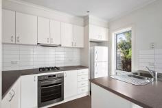 6/34 Coral Street Frankston VIC 3199 $570,000 - $627,000 Embrace the essence of modern living in this well-loved two-bedroom unit, nestled privately within an exclusive community just moments away from great coffee and serene local parks. Featuring modern finishes and thoughtful conveniences throughout a seamless floorplan, the home offers a secure and inviting sanctuary for those looking to downsize without compromising on quality. A hassle-free living experience awaits beyond an appealing facade, revealing low-maintenance courtyard gardens and private interiors awash in natural light. Generous proportions embrace an open-plan living and dining space where a neutral colour palette merges with a well-appointed kitchen complete with Westinghouse appliances, a dual sink, and ample cabinetry. A central bathroom with direct ensuite access from the master bedroom, serves both family and friends, while additional features include a separate powder room, dedicated laundry, a split-system heating/cooling unit, a covered patio with low-maintenance surroundings, water tank, and single garage. With a central address close to public transport, schools, everyday retail, and Frankston's vibrant CBD, this private residence welcomes those seeking security and peace-of-mind in an area known for its friendly community and convenient position. 