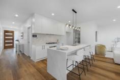  21 Chambers Ave Richmond SA 5033 $1,195,000 - $1,295,000 With four bedrooms and three bathrooms spread over two spacious levels, this sophisticated brand new build combines luxury with lifestyle at every turn. From electric sliding gates and intercom with keyless entry to its complete Smart Home System, everything can be scheduled or controlled remotely with just the push of a button. From a wide hallway entry, a front bedroom presents a wonderful option for guests, or a highly sought ground floor master with built-in robes and gorgeous floor length windows welcoming abundant natural light; a most luxurious bathroom with full-height tiling, floating vanity and frameless shower guaranteed to wash away daily stressors in an instant. Overlooking a fabulous open living and dining space, the kitchen of your dreams is home to SMEG stainless steel appliances including dishwasher, 900mm oven and 5-burner gas cooktop, infinite storage, a superb island with breakfast bar and pendant lighting and an invaluable butler's pantry with direct access to the garage. Sliding doors open onto an alfresco entertaining space under the protection of the main roof, overlooking a secure low maintenance courtyard with lawn strip. Automatic sensor lights will guide you upstairs, where three additional bedrooms add plenty of flexibility to sleeping arrangements, including a supersized master with stunning treetop views, huge walk-in robe and elegant ensuite bathroom with dual basin vanity and frameless shower; bedrooms three and four serviced by an equally impressive central bathroom with the addition of a deep freestanding bath. All the essentials: - Mirrored robes to bedrooms 3 & 4 - Separate laundry with alfresco access - Daikin Ducted reverse cycle air conditioning - Under stair storage - Double garage with internal + rear access - Secure gated front yard - Upstairs study nook - Torrens titled In a wonderful city fringe location just 5kms from the CBD and a little further to the sea, a world of convenience awaits on your doorstep. 