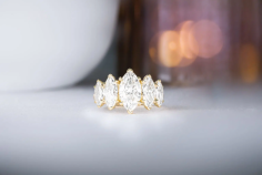  Marquise engagement rings from Diamondport Brisbane combine royal elegance with modern brilliance. Their elongated shape flatters the hand and appears larger than round diamonds. Expertly handcrafted with precision and customizable settings, each ring highlights the diamond’s unique sparkle. Book a private consultation to create a bespoke piece that reflects your style and love story. 