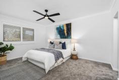  14 Small St Wyoming NSW 2250 Big on space, big on style, and beautifully upgraded inside and out – this is the ultimate family home for buyers seeking comfort, flexibility, and a move-in-ready lifestyle. Positioned in the tightly held ‘Valley View’ enclave of Wyoming, 14 Small Street captures breathtaking mountain and district views from its elevated setting while offering a spacious multi-level floor plan and standout entertaining spaces both inside and out. Lovingly renovated and further enhanced by its current owners, this impressive home pairs timeless design with a sleek modern finish and thoughtful lifestyle additions – including a fully landscaped backyard, extended outdoor entertaining zone, solar power, and a powered shipping container ideal for extra storage or a creative retreat. Features include: – Quality-built residence with striking street appeal in the prized ‘Valley View’ precinct. – Stylish interiors spread across two expansive levels, featuring warm timber tones, floating floors, a modern neutral palette, and contemporary finishes — including sleek plantation shutters. – Generous 683sqm block with dual-level lawns, beautifully landscaped gardens, and convenient side access. – Sleek open-plan kitchen with abundant bench and storage space, recently updated with quality new appliances and perfectly positioned to overlook the backyard and outdoor entertaining zone. – Multiple living and entertaining areas, including a spacious main lounge, separate dining, and tranquil upper-level retreat. – Four bedrooms upstairs (including a king-sized master suite with a walk-in robe, ensuite, and access to a shared balcony), plus a self-contained guest suite with ensuite on the entry level, perfect for teens, guests, or extended family. – Covered entertaining area extended with a pergola, creating the perfect space for relaxed gatherings and alfresco dining. – Tiered backyard with two grassy play zones – ideal for kids and pets. – 9.68kW solar panel system (22 panels, owned outright) with feedback to the grid. – Ducted air conditioning upstairs + split systems on the lower level for year-round comfort – Two-car garage with electric doors and internal access + gated off-street parking for an additional two vehicles. – Powered shipping container providing extra storage or potential conversion to a creative space or indoor-outdoor room (relocatable if needed). Positioned within walking distance of Valley View Public School (550m) and just minutes to local shops, transport, Gosford CBD, and the M1 for easy access to Sydney or Newcastle. Erina Fair, waterfront reserves, bushwalks, and beaches are all nearby, completing the ideal lifestyle package. 