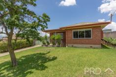  90 Broughton Street Tumut NSW 2720 Set upon an extremely generous and elevated allotment, sits this four-bedroom solid brick family home. Boasting four great sized bedrooms, two bathrooms, sun-filtered kitchen overlooking the easterly elevated aspect and with semi formal living and dining areas, all serviced by wood box fire heater. You will love the space afforded and potential on offer, in this large four-bedroom family brick home, offering further development options with such a large accessible allotment. Do not miss your opportunity, call today to book your inspection. Premiere Features: - Four great sized bedrooms, bedroom 1 and 2 interconnecting and bedroom 3 and 4 also interconnecting - Large well-maintained bathroom with separate shower and bath with single vanity and shaving cabinet - Separate toilet accessed via the bathroom - Sun-filtered kitchen with ample storage options, electric cooktop, dishwasher, great bench space and direct rear external access - Semi formal dining area positioned between the living and kitchen and serviced by wood box fire heater and air conditioning wall unit - Great size front living area - Large fully covered rear entertaining area or covered car park option with lighting - External laundry under the roof line - Additional second bathroom with shower and toilet accessible via the laundry - Fully fenced and pet friendly rear house yard - Garden shed - Total allotment of approximately 2,409m² with vehicle access throughout - Currently tenanted at $420 per week Do not miss your opportunity to secure such an expansive allotment with a solid family brick home. 