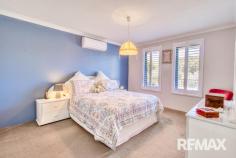  16 Dorrigo Bend Yanchep WA 6035 $600,000 Nestled on an elevated 347m² block in the serene coastal suburb of Yanchep, 16 Dorrigo Bend presents a meticulously maintained Federation-style residence that seamlessly blends timeless charm with modern comfort. This home offers a tranquil outlook and a lifestyle of convenience, being just moments away from pristine beaches, reputable schools, and a variety of shopping options. Upon entry, you’re greeted by a spacious master bedroom featuring plantation shutters, plush carpeting, a walk-in robe, and a split system air conditioner, creating a private retreat. The master also boasts an ensuite complete with a vanity, WC, and shower for added comfort and convenience. The double-door theatre room, adorned with matching shutters and soft carpets, provides an ideal space for family movie nights or entertaining guests. The home’s open-plan living and dining area is bathed in natural light, accentuated by plantation shutters throughout and a second split system for year-round comfort. The kitchen is a culinary delight, equipped with a 900mm oven, a five-burner gas cooktop, a walk-in pantry, a double-door fridge recess, and ample bench space with laminate tops, catering to both everyday meals and gourmet creations. Accommodation includes two additional double-sized bedrooms, each with plantation shutters and built-in robes, one of which is at the front of the home and offers versatility as a study or guest room. The modern family bathroom features a single vanity and a separate bath and shower, complemented by a double-door linen cupboard in the passage for additional storage. The spacious laundry provides direct access to the double garage via a shopper’s entry, enhancing daily convenience. Outside, the paved alfresco area invites outdoor dining and relaxation, overlooking an easy-care garden with artificial lawn bordered by garden beds and side paving, perfect for low-maintenance living. Located within close proximity to Yanchep Beach Primary School, Yanchep Secondary College, and the Yanchep Central Shopping Centre, this home offers both comfort and accessibility. The newly completed Yanchep Train station is a short 5 minute drive and the Freeway extension to Romeo Drive makes the coastal region of Yanchep so much more assessable. Experience the perfect blend of classic elegance and modern living in this exceptional Federation-style residence. 