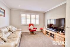  16 Dorrigo Bend Yanchep WA 6035 $600,000 Nestled on an elevated 347m² block in the serene coastal suburb of Yanchep, 16 Dorrigo Bend presents a meticulously maintained Federation-style residence that seamlessly blends timeless charm with modern comfort. This home offers a tranquil outlook and a lifestyle of convenience, being just moments away from pristine beaches, reputable schools, and a variety of shopping options. Upon entry, you’re greeted by a spacious master bedroom featuring plantation shutters, plush carpeting, a walk-in robe, and a split system air conditioner, creating a private retreat. The master also boasts an ensuite complete with a vanity, WC, and shower for added comfort and convenience. The double-door theatre room, adorned with matching shutters and soft carpets, provides an ideal space for family movie nights or entertaining guests. The home’s open-plan living and dining area is bathed in natural light, accentuated by plantation shutters throughout and a second split system for year-round comfort. The kitchen is a culinary delight, equipped with a 900mm oven, a five-burner gas cooktop, a walk-in pantry, a double-door fridge recess, and ample bench space with laminate tops, catering to both everyday meals and gourmet creations. Accommodation includes two additional double-sized bedrooms, each with plantation shutters and built-in robes, one of which is at the front of the home and offers versatility as a study or guest room. The modern family bathroom features a single vanity and a separate bath and shower, complemented by a double-door linen cupboard in the passage for additional storage. The spacious laundry provides direct access to the double garage via a shopper’s entry, enhancing daily convenience. Outside, the paved alfresco area invites outdoor dining and relaxation, overlooking an easy-care garden with artificial lawn bordered by garden beds and side paving, perfect for low-maintenance living. Located within close proximity to Yanchep Beach Primary School, Yanchep Secondary College, and the Yanchep Central Shopping Centre, this home offers both comfort and accessibility. The newly completed Yanchep Train station is a short 5 minute drive and the Freeway extension to Romeo Drive makes the coastal region of Yanchep so much more assessable. Experience the perfect blend of classic elegance and modern living in this exceptional Federation-style residence. 
