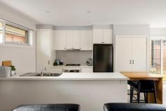  1/9 Beaconsfield Avenue Frankston VIC 3199 $750,000 - $825,000 Boasting a proud street-facing position mere moments from Frankston's vibrant array of recreational and retail delights, this meticulously presented residence opens its doors to a lifestyle where comfort meets convenience. Awash in natural light, this beautifully crafted home features carefully designed spaces and high-quality finishes, offering an enchanting living experience over two thoughtfully arranged levels. Greeted with a fluid design and practical floors, it keeps an uncomplicated layout with an open-plan living and dining zone and stone-finished kitchen outfitted with stainless appliances, timber breakfast bar, 4 x split systems (including bedrooms) and practical storage solutions. Surrounded by lush, established gardens, a sun-drenched patio offers a seamless blend of indoor and outdoor living, with glass stacker doors effortlessly retracting to forge a harmonious entertaining space. Three bedrooms and two bathrooms occupy a first-floor accommodation layout, featuring a spacious master suite with generous walk-in robe, light-filled ensuite. A powder room, open study, no body corporate fees, and a spacious double garage enhance the practicality of this home, making it appealing to professional couples, investors, and first-time buyers alike. Located just moments from Monash University and Frankston Hospital, and well-within the FHSZ, it offers effortless access to Frankston's Bayside Shopping Centre, Frankston Train Station, and the freeway for ultimate convenience. 